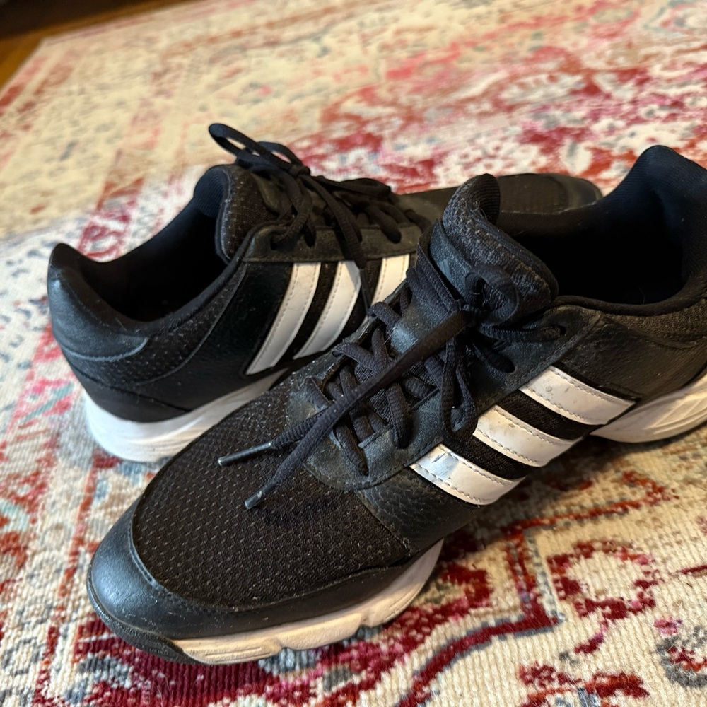 Adidas Black and White golf shoes